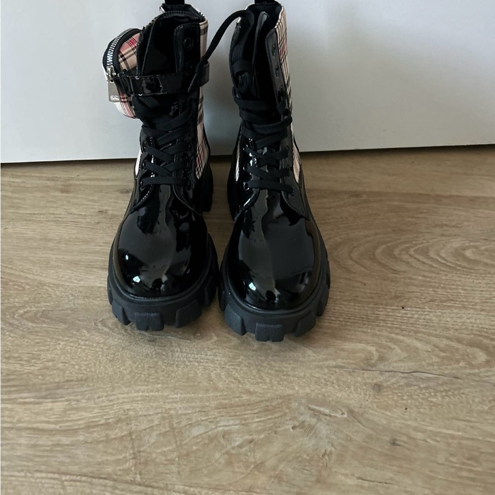 Black Combat Boots with Glossy Finish and Chunky Soles